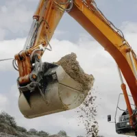 Large heavy duty back hoe scoop in general construction.